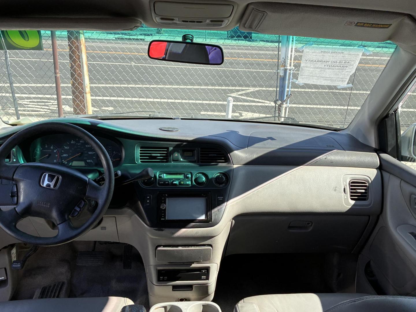 2004 Honda Odyssey EX w/ Leather and DVD (5FNRL18054B) with an 3.5L V6 SOHC 24V engine, 5-Speed Automatic Overdrive transmission, located at 44356 Date Ave., Lancaster, CA, 93534, (661) 945-6555, 34.688919, -118.139374 - Photo#3