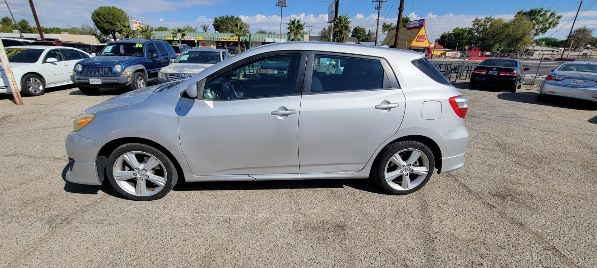 2009 Toyota Matrix S 5-Speed AT (2T1KE40E39C) with an 2.4L L4 engine, 5-Speed Automatic Overdrive transmission, located at 44356 Date Ave., Lancaster, CA, 93534, (661) 945-6555, 34.688919, -118.139374 - Photo#1