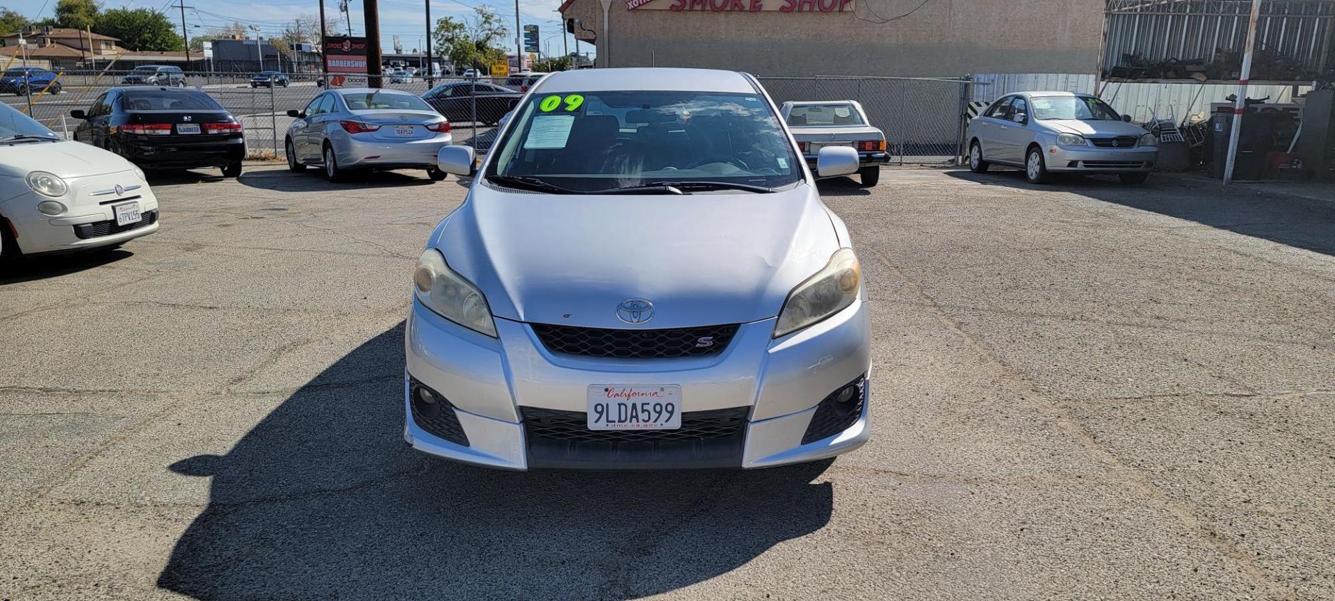 2009 Toyota Matrix S 5-Speed AT (2T1KE40E39C) with an 2.4L L4 engine, 5-Speed Automatic Overdrive transmission, located at 44356 Date Ave., Lancaster, CA, 93534, (661) 945-6555, 34.688919, -118.139374 - Photo#2