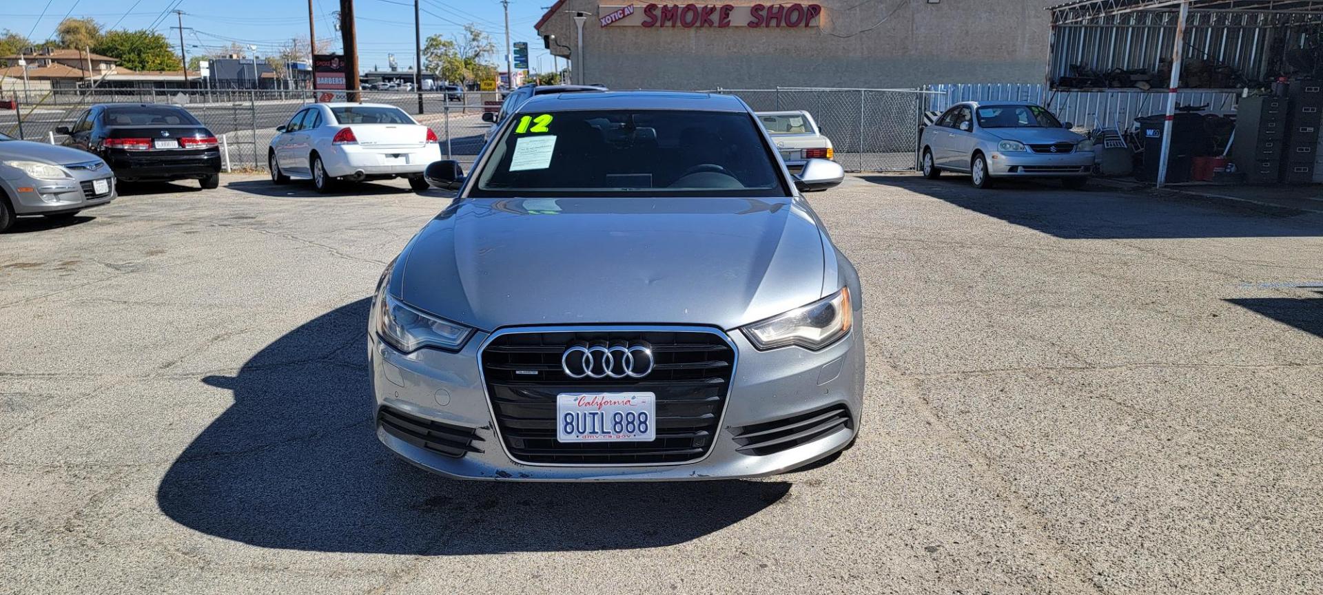 2012 Audi A6 3.0T quattro Tiptronic (WAUGGAFC2CN) with an 3.0L V6 DOHC 24V TURBO engine, 6-Speed Automatic transmission, located at 44356 Date Ave., Lancaster, CA, 93534, (661) 945-6555, 34.688919, -118.139374 - Photo#0