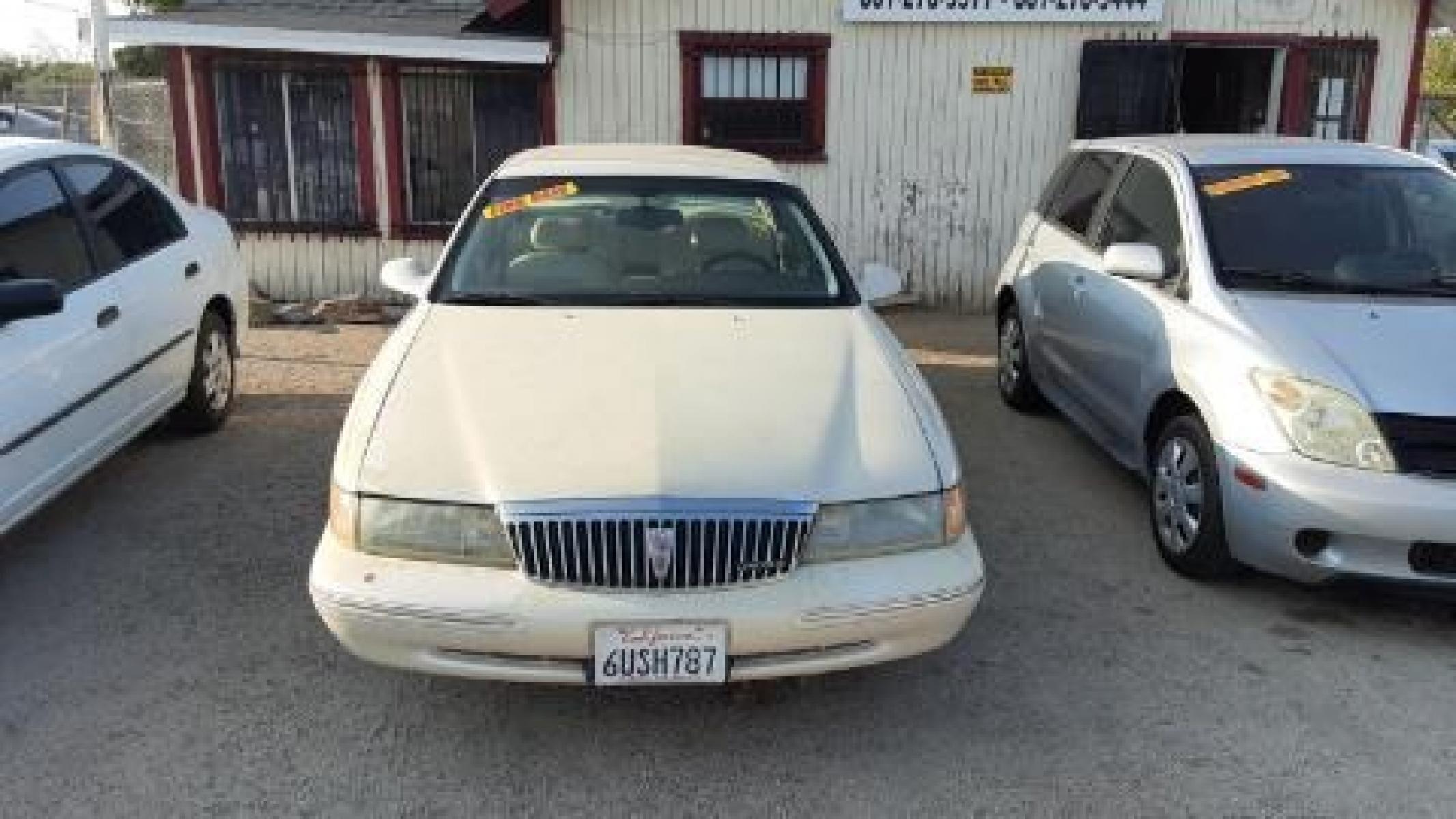 1997 Cream Lincoln Continental , Automatic transmission, located at 44356 Date Ave., Lancaster, CA, 93534, (661) 945-6555, 34.688919, -118.139374 - Photo #0