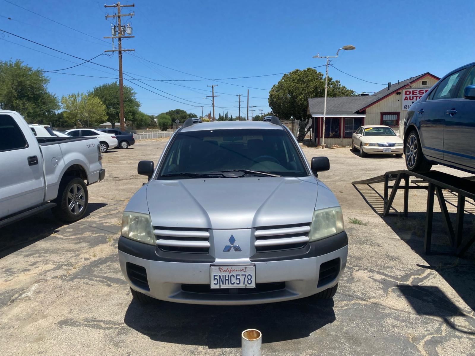 2005 Mitsubishi Endeavor LS AWD (4A4MN21S95E) with an 3.8L V6 SOHC 24V engine, 4-Speed Automatic Overdrive transmission, located at 44356 Date Ave., Lancaster, CA, 93534, (661) 945-6555, 34.688919, -118.139374 - Photo #0