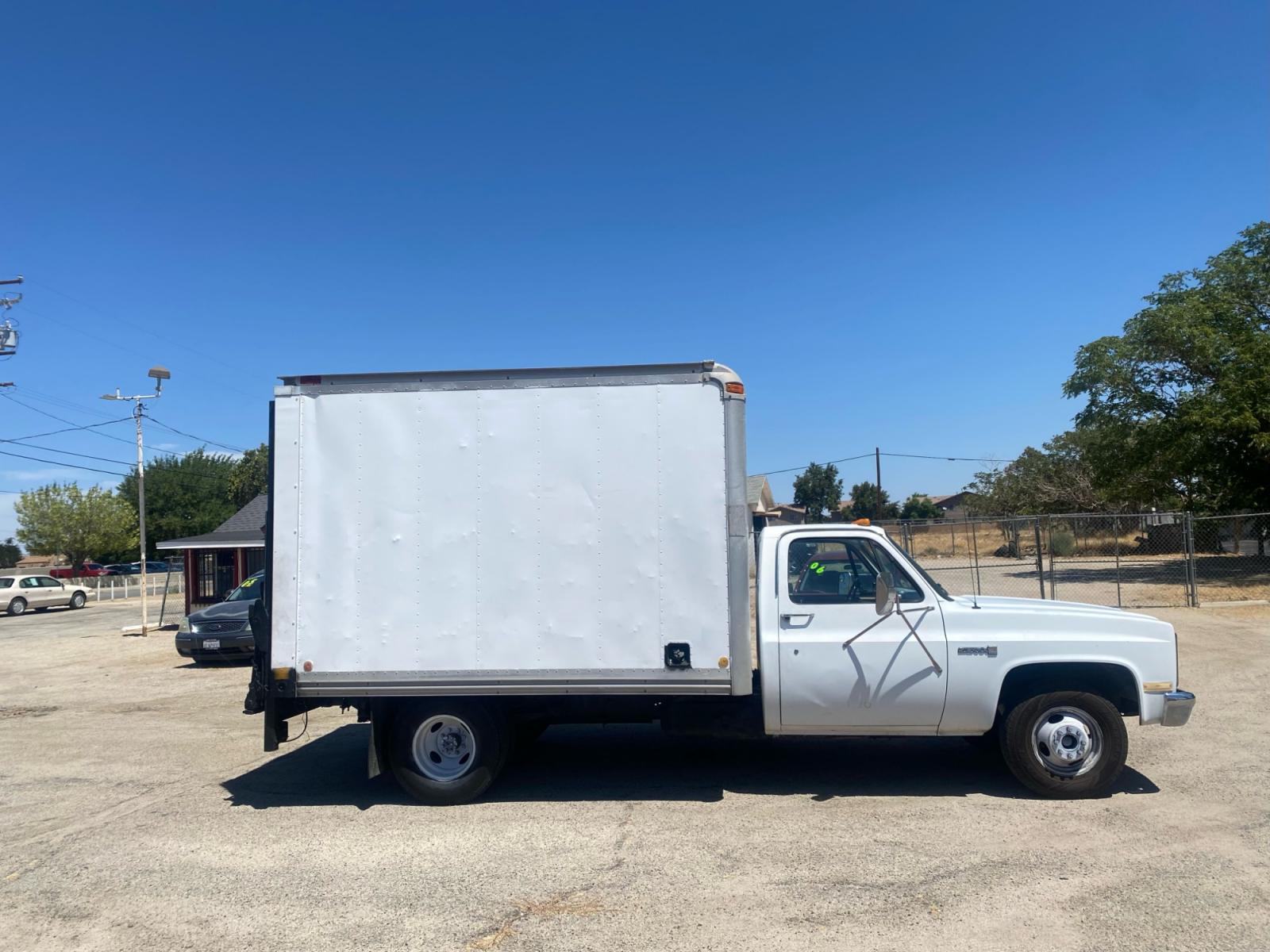 1988 GMC R3500 High Sierra 2WD (1GDHR34K4JJ) with an 5.7L V8 OHV 16V engine, located at 44356 Date Ave., Lancaster, CA, 93534, (661) 945-6555, 34.688919, -118.139374 - Photo #0